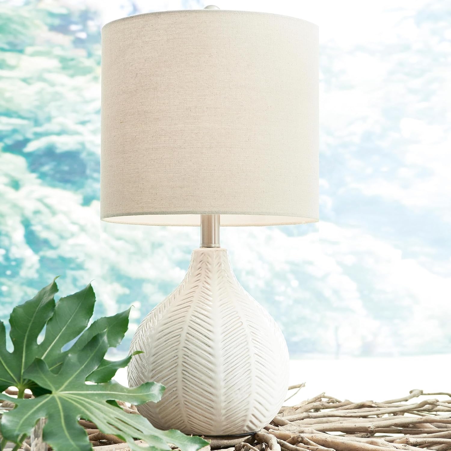 Signature Design by Ashley Rainermen Casual Ceramic Table Lamp, Transparent White Glaze Finish, Drum Hardback Fabric Shade, 11" W x 11" D x 21" H, Off White - Image 2